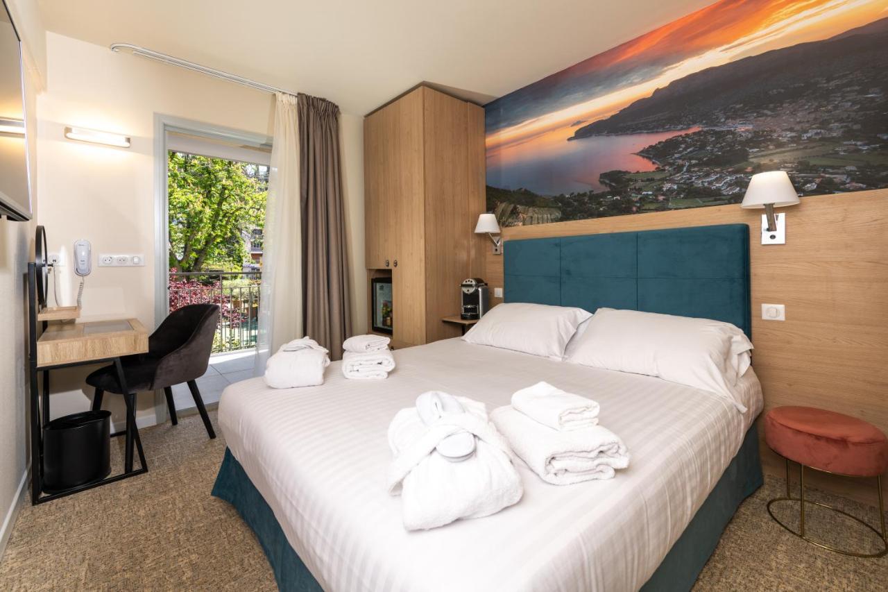 Chambre Lits Queen-Size Supérieure avec Balcon - Vue sur Jardin